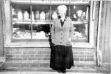 Mrs Dean outside her Sweet Shop, Eccleshall,