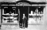 Frank Hudson outside his Chemist Shop, Eccleshall,