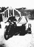Policeman on a motorcycle, Stone