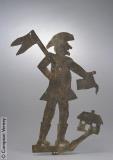 Man with a house weathervane