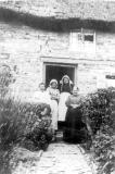 Lighthorne.  Group of women in doorway of a cottage