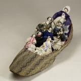 Slipper and Wooden Dolls