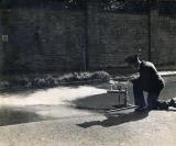 An Inspector Using a Flow and Pressure Gauge, Leamington Spa